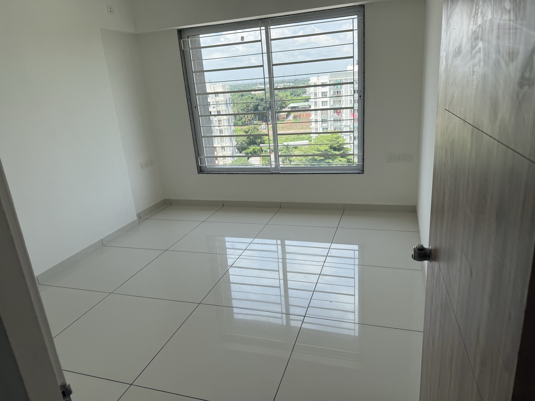 Bedroom 1 with large window and open views
